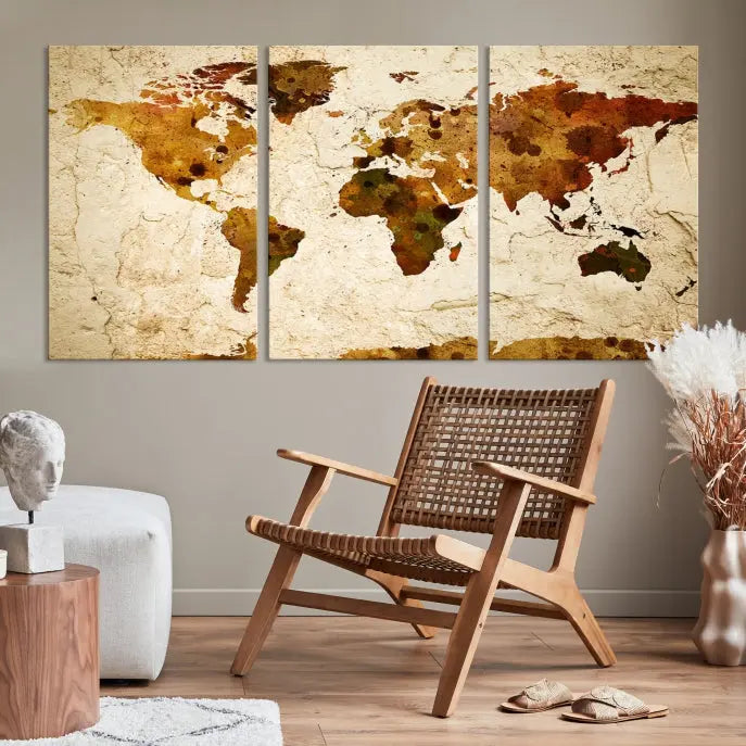 The Sepia World Map Wall Art Canvas Print showcases a vintage world map on a textured background, expertly mounted on museum-quality canvas with a UV-protective coating.