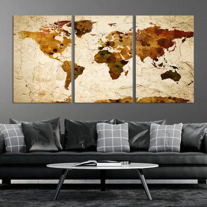 The Sepia World Map Wall Art Canvas Print showcases a vintage world map on a textured background, expertly mounted on museum-quality canvas with a UV-protective coating.