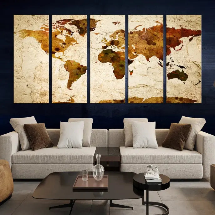 The Sepia World Map Wall Art Canvas Print showcases a vintage world map on a textured background, expertly mounted on museum-quality canvas with a UV-protective coating.