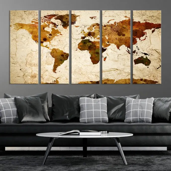 The Sepia World Map Wall Art Canvas Print showcases a vintage world map on a textured background, expertly mounted on museum-quality canvas with a UV-protective coating.