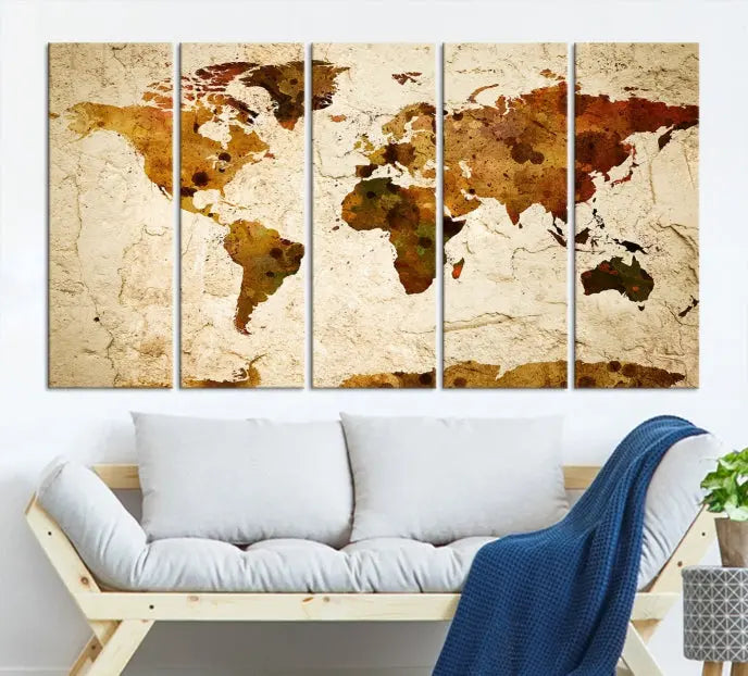 The Sepia World Map Wall Art Canvas Print showcases a vintage world map on a textured background, expertly mounted on museum-quality canvas with a UV-protective coating.