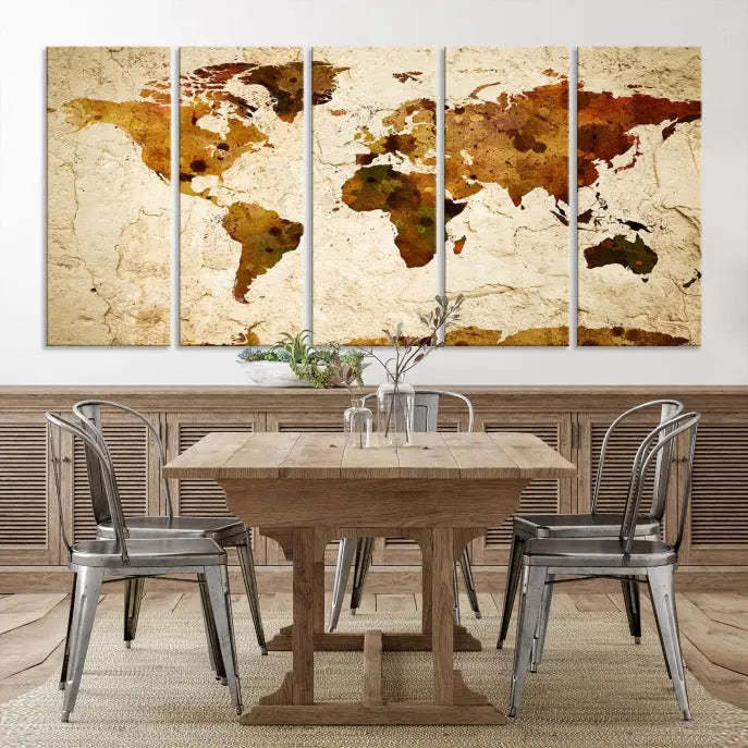 The Sepia World Map Wall Art Canvas Print showcases a vintage world map on a textured background, expertly mounted on museum-quality canvas with a UV-protective coating.