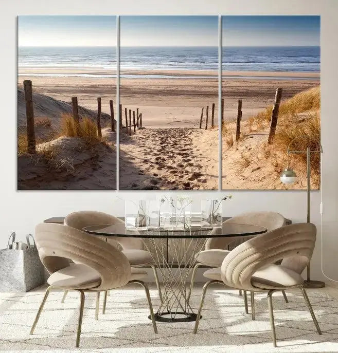 The "Serene Beach Path Canvas – Coastal Landscape Wall Art Triptych – Tranquil Ocean View for Living Room" is tastefully displayed, adding a beautiful coastal touch to the room's ambiance.