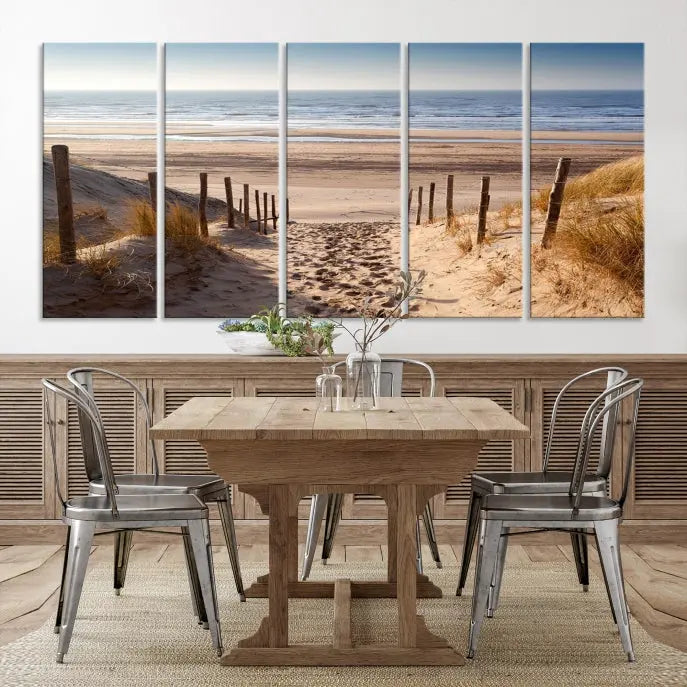 The "Serene Beach Path Canvas – Coastal Landscape Wall Art Triptych – Tranquil Ocean View for Living Room" is tastefully displayed, adding a beautiful coastal touch to the room's ambiance.