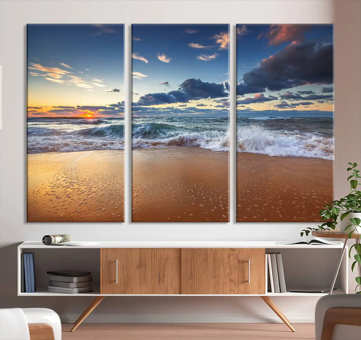 The Serene Beach Sunset Canvas Wall Art, featuring a tranquil sunset over ocean waves on sand, captures the essence of coastal home decor.