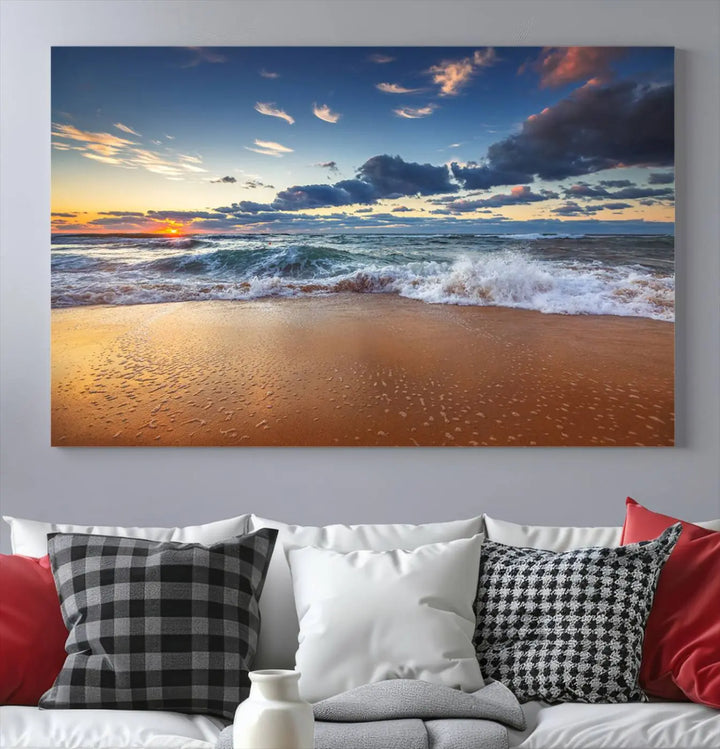 The Serene Beach Sunset Canvas Wall Art, featuring a tranquil sunset over ocean waves on sand, captures the essence of coastal home decor.