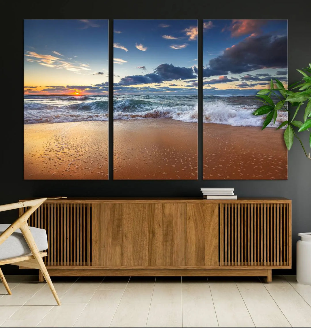 The Serene Beach Sunset Canvas Wall Art, featuring a tranquil sunset over ocean waves on sand, captures the essence of coastal home decor.