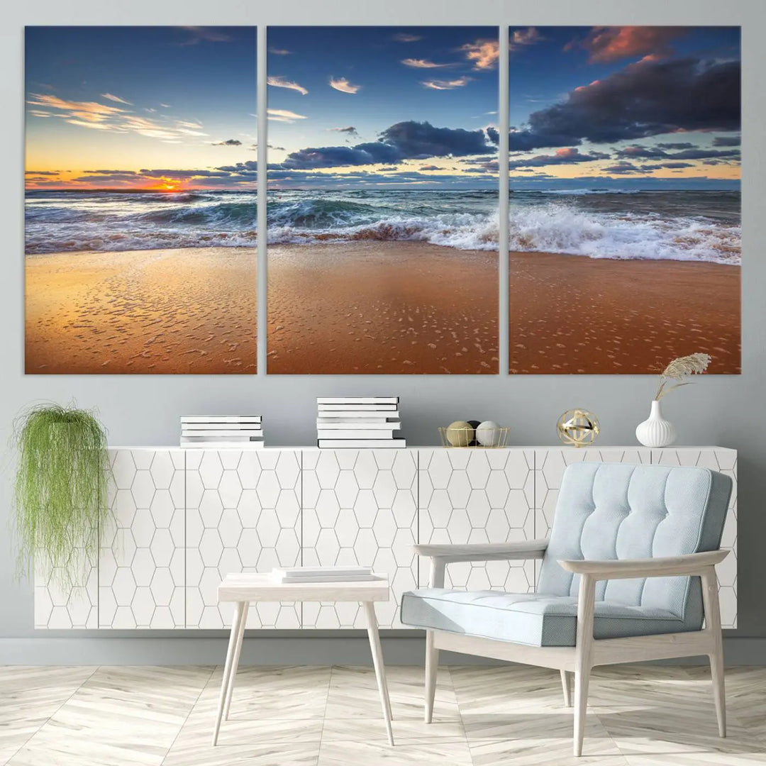 The Serene Beach Sunset Canvas Wall Art, featuring a tranquil sunset over ocean waves on sand, captures the essence of coastal home decor.