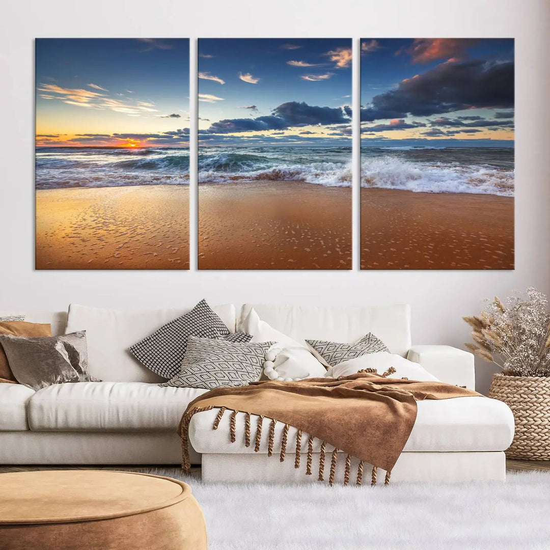 The Serene Beach Sunset Canvas Wall Art, featuring a tranquil sunset over ocean waves on sand, captures the essence of coastal home decor.