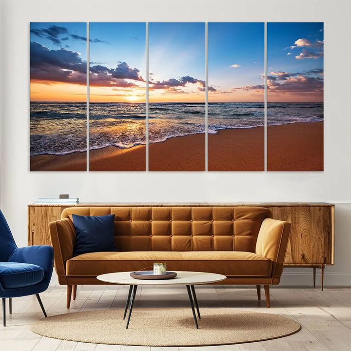 The "Serene Ocean Sunset Canvas Print, Golden Hour Beach Wall Art" offers a captivating view from a sandy beach, where sunlight reflects on the water amidst clouds in a blue sky. This piece, created with Giclee canvas and gallery wrap featuring Canon print quality, brings tranquility and an ideal enhancement to coastal interiors.