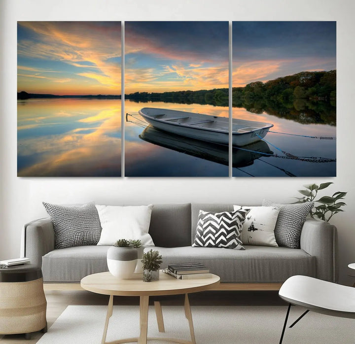 Serene rowboat on calm lake triptych canvas art with sunset reflections. Giclee print for tranquil home or office decor.