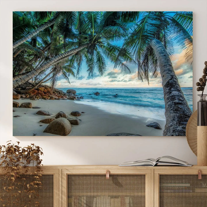 The Serene Tropical Beach Palm Trees Wall Art Canvas Print—a Coastal Paradise 3-Panel Artwork featuring ocean waves—enhances the space with its Giclee technology print.