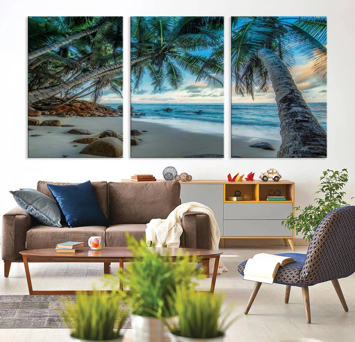 The Serene Tropical Beach Palm Trees Wall Art Canvas Print—a Coastal Paradise 3-Panel Artwork featuring ocean waves—enhances the space with its Giclee technology print.