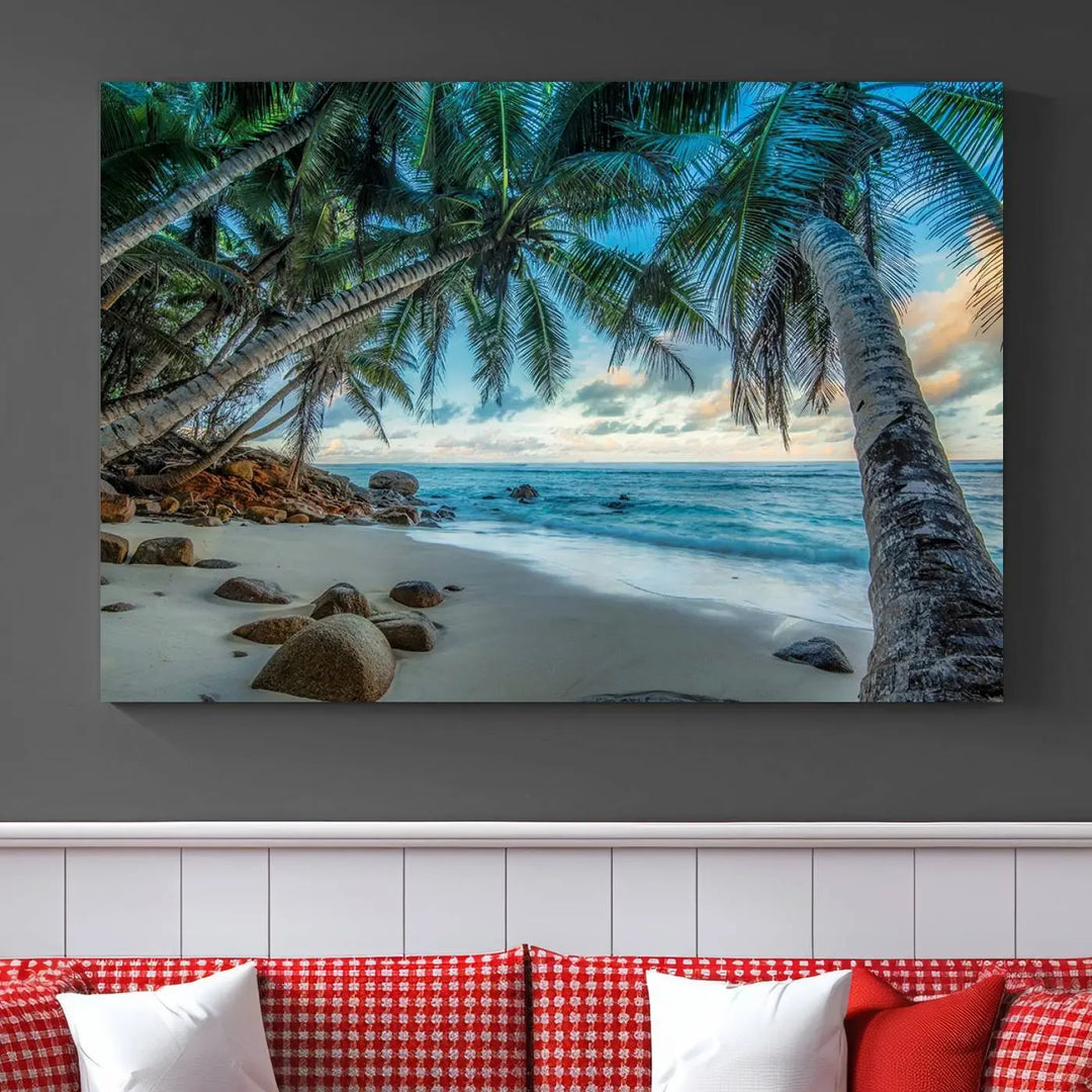 The Serene Tropical Beach Palm Trees Wall Art Canvas Print—a Coastal Paradise 3-Panel Artwork featuring ocean waves—enhances the space with its Giclee technology print.