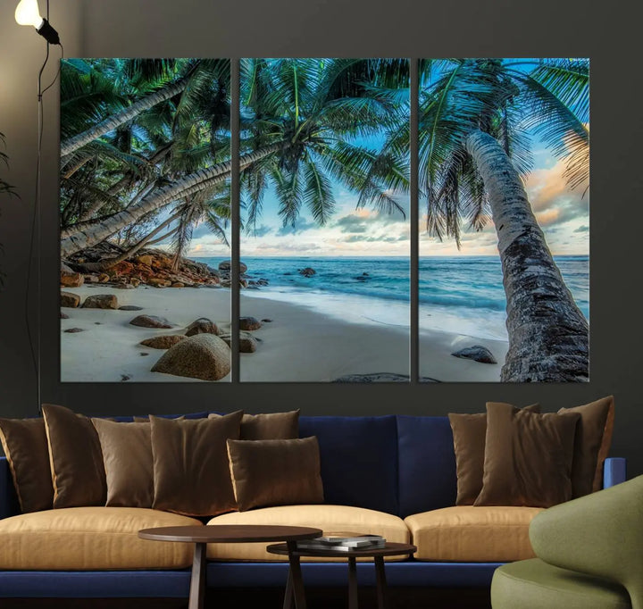 The Serene Tropical Beach Palm Trees Wall Art Canvas Print—a Coastal Paradise 3-Panel Artwork featuring ocean waves—enhances the space with its Giclee technology print.