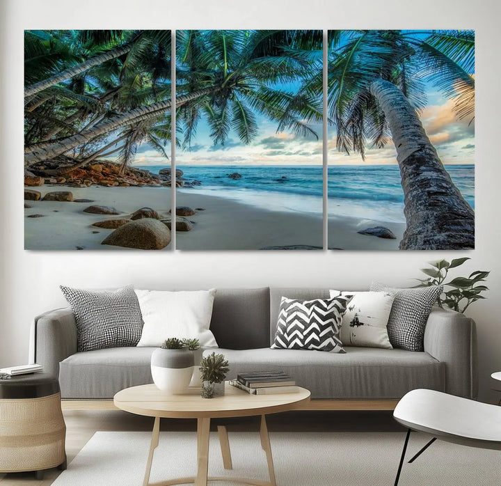 The Serene Tropical Beach Palm Trees Wall Art Canvas Print—a Coastal Paradise 3-Panel Artwork featuring ocean waves—enhances the space with its Giclee technology print.