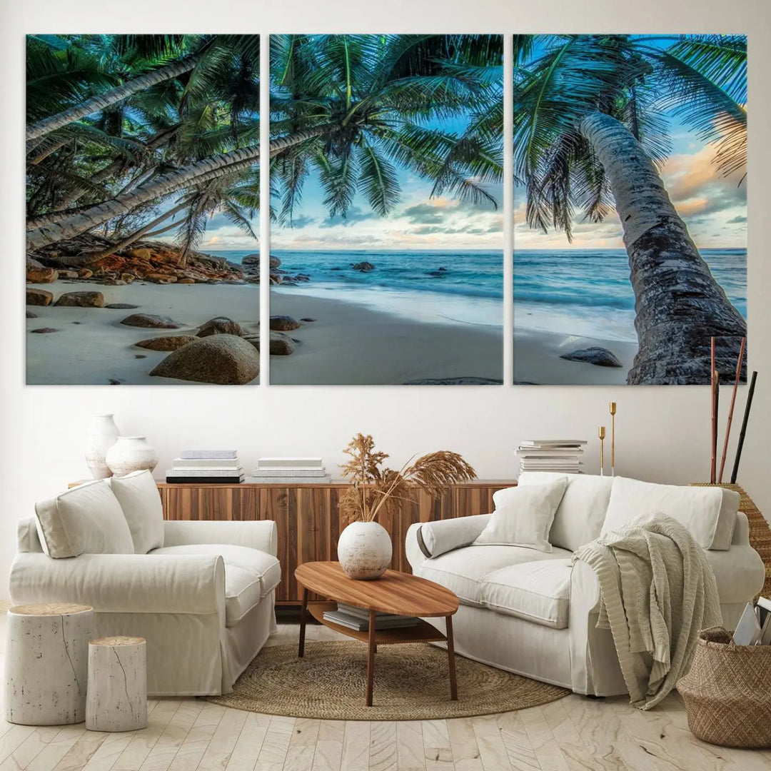 The Serene Tropical Beach Palm Trees Wall Art Canvas Print—a Coastal Paradise 3-Panel Artwork featuring ocean waves—enhances the space with its Giclee technology print.