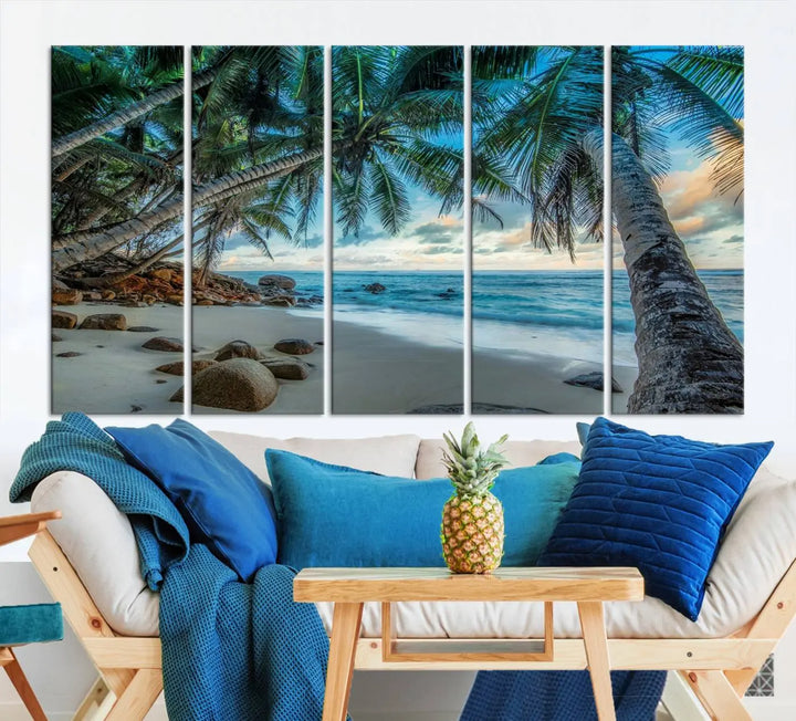 The Serene Tropical Beach Palm Trees Wall Art Canvas Print—a Coastal Paradise 3-Panel Artwork featuring ocean waves—enhances the space with its Giclee technology print.