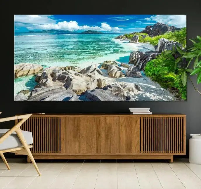 The "Seychelles Island and Beach Wall Art Canvas Print," consisting of three panels depicting a tropical beach scene with turquoise water and rocks on museum-quality canvases, is displayed prominently.