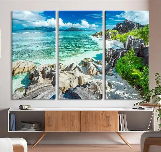 The "Seychelles Island and Beach Wall Art Canvas Print," consisting of three panels depicting a tropical beach scene with turquoise water and rocks on museum-quality canvases, is displayed prominently.