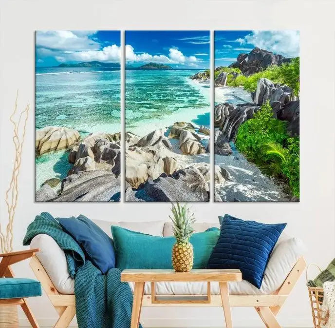 The "Seychelles Island and Beach Wall Art Canvas Print," consisting of three panels depicting a tropical beach scene with turquoise water and rocks on museum-quality canvases, is displayed prominently.