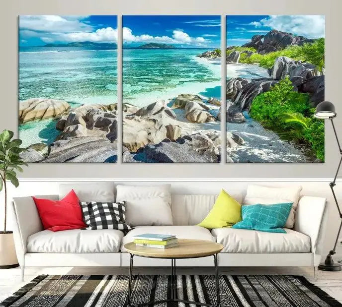 The "Seychelles Island and Beach Wall Art Canvas Print," consisting of three panels depicting a tropical beach scene with turquoise water and rocks on museum-quality canvases, is displayed prominently.