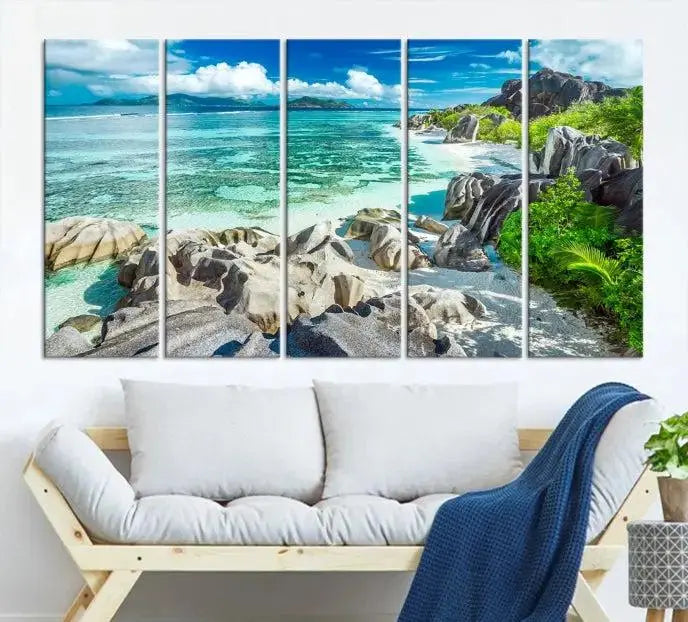 The "Seychelles Island and Beach Wall Art Canvas Print," consisting of three panels depicting a tropical beach scene with turquoise water and rocks on museum-quality canvases, is displayed prominently.