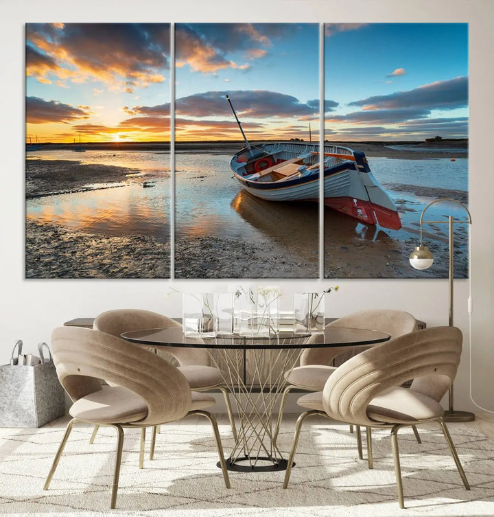 The "Small Boat At The Beach Sunset Wall Art Canvas Print," a three-panel masterpiece crafted on museum-quality canvas, hangs elegantly.