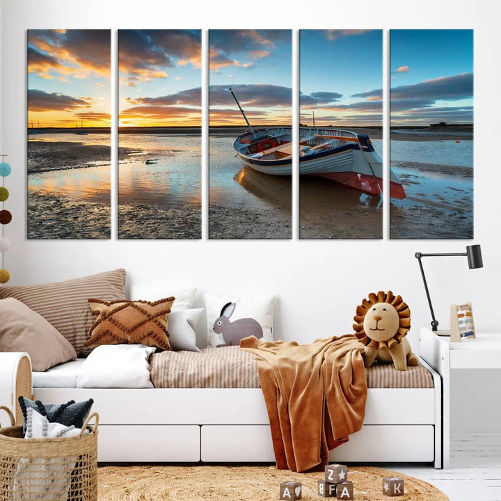 The "Small Boat At The Beach Sunset Wall Art Canvas Print," a three-panel masterpiece crafted on museum-quality canvas, hangs elegantly.