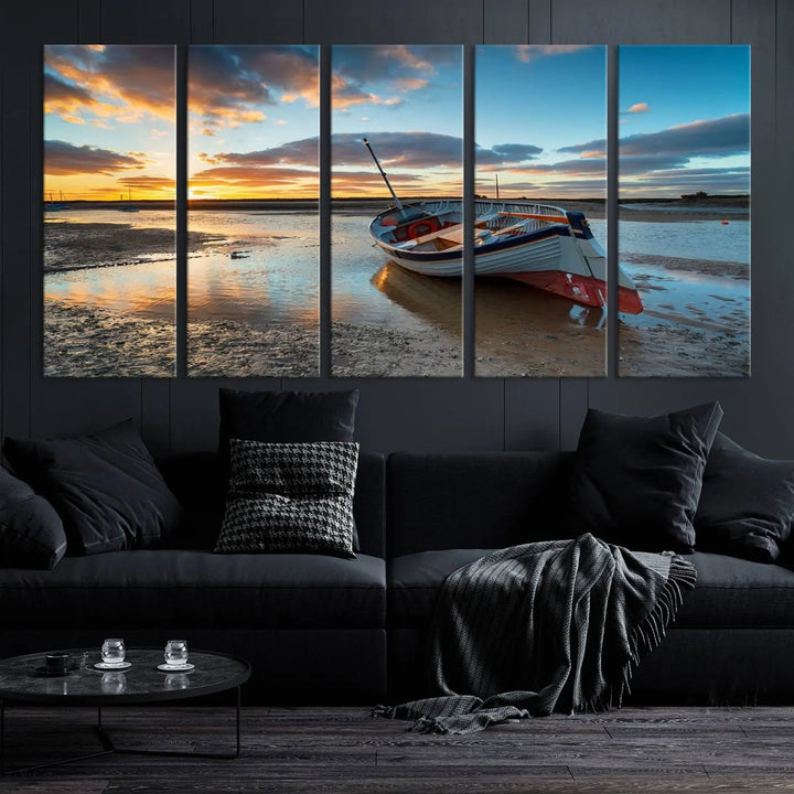 The "Small Boat At The Beach Sunset Wall Art Canvas Print," a three-panel masterpiece crafted on museum-quality canvas, hangs elegantly.