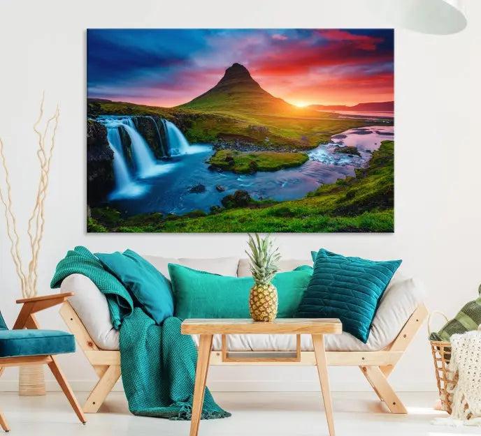 The living room displays a triptych wall art titled "Snaefellsjökull Nal Park and Kirkjufell Mountain," which captures a stunning sunset over a mountain and waterfall on museum-quality canvas. Each piece of the artwork is treated with UV-protective coating to ensure long-lasting vibrancy.