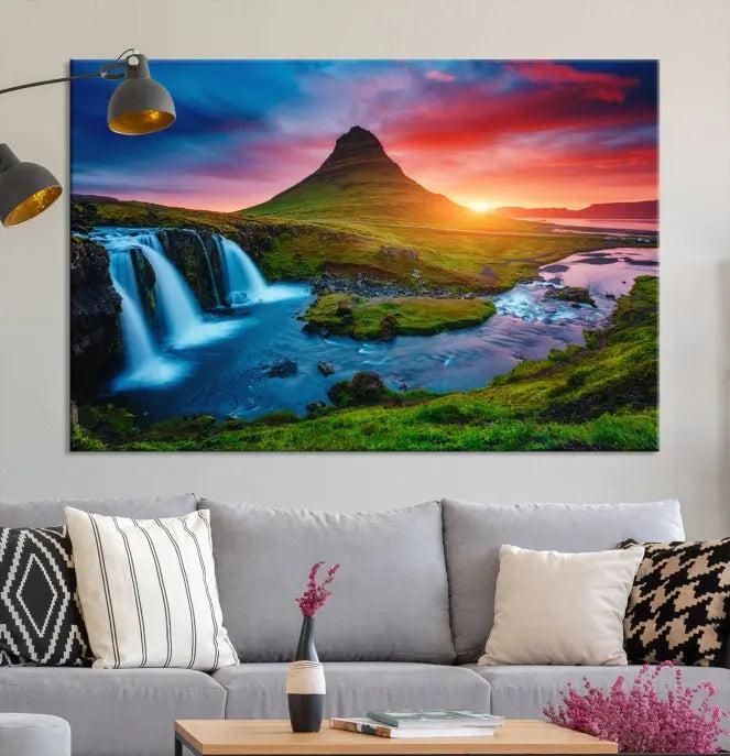 The living room displays a triptych wall art titled "Snaefellsjökull Nal Park and Kirkjufell Mountain," which captures a stunning sunset over a mountain and waterfall on museum-quality canvas. Each piece of the artwork is treated with UV-protective coating to ensure long-lasting vibrancy.