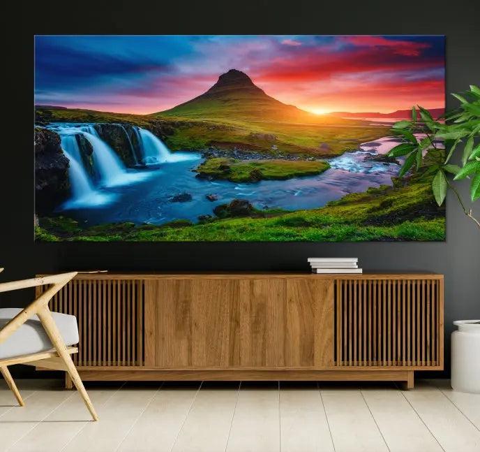 The living room displays a triptych wall art titled "Snaefellsjökull Nal Park and Kirkjufell Mountain," which captures a stunning sunset over a mountain and waterfall on museum-quality canvas. Each piece of the artwork is treated with UV-protective coating to ensure long-lasting vibrancy.