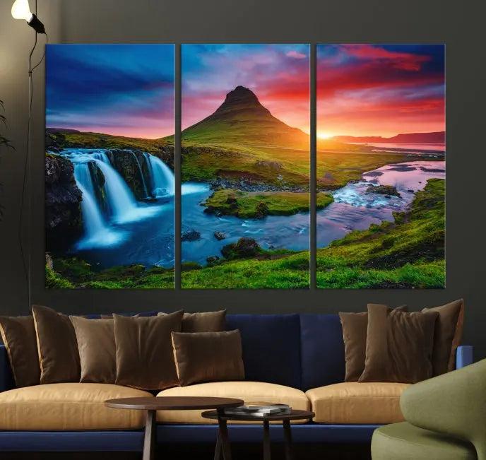 The living room displays a triptych wall art titled "Snaefellsjökull Nal Park and Kirkjufell Mountain," which captures a stunning sunset over a mountain and waterfall on museum-quality canvas. Each piece of the artwork is treated with UV-protective coating to ensure long-lasting vibrancy.