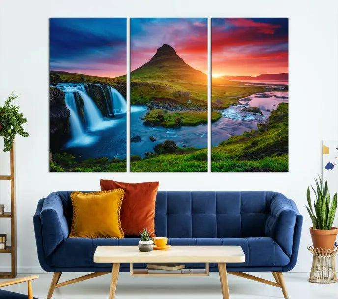 The living room displays a triptych wall art titled "Snaefellsjökull Nal Park and Kirkjufell Mountain," which captures a stunning sunset over a mountain and waterfall on museum-quality canvas. Each piece of the artwork is treated with UV-protective coating to ensure long-lasting vibrancy.