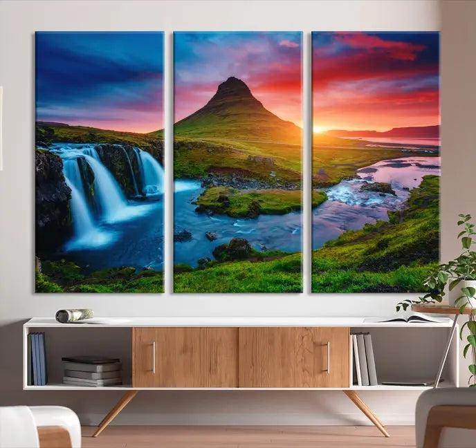 The living room displays a triptych wall art titled "Snaefellsjökull Nal Park and Kirkjufell Mountain," which captures a stunning sunset over a mountain and waterfall on museum-quality canvas. Each piece of the artwork is treated with UV-protective coating to ensure long-lasting vibrancy.