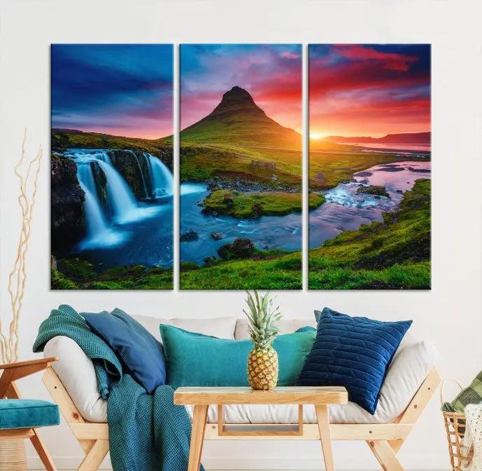 The living room displays a triptych wall art titled "Snaefellsjökull Nal Park and Kirkjufell Mountain," which captures a stunning sunset over a mountain and waterfall on museum-quality canvas. Each piece of the artwork is treated with UV-protective coating to ensure long-lasting vibrancy.