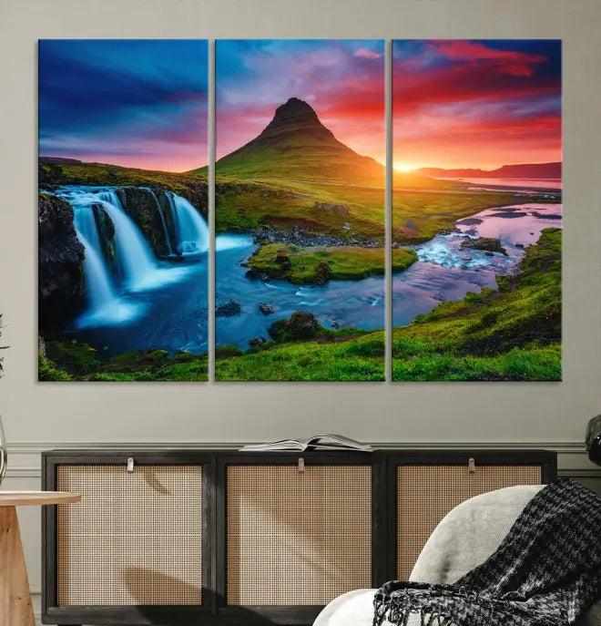 The living room displays a triptych wall art titled "Snaefellsjökull Nal Park and Kirkjufell Mountain," which captures a stunning sunset over a mountain and waterfall on museum-quality canvas. Each piece of the artwork is treated with UV-protective coating to ensure long-lasting vibrancy.