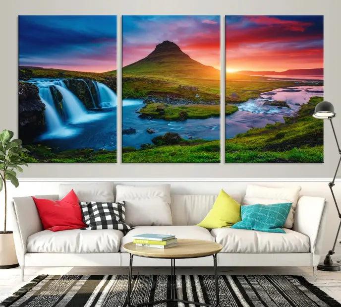 The living room displays a triptych wall art titled "Snaefellsjökull Nal Park and Kirkjufell Mountain," which captures a stunning sunset over a mountain and waterfall on museum-quality canvas. Each piece of the artwork is treated with UV-protective coating to ensure long-lasting vibrancy.