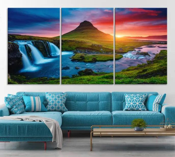 The living room displays a triptych wall art titled "Snaefellsjökull Nal Park and Kirkjufell Mountain," which captures a stunning sunset over a mountain and waterfall on museum-quality canvas. Each piece of the artwork is treated with UV-protective coating to ensure long-lasting vibrancy.