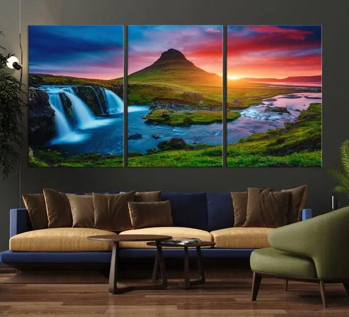 The living room displays a triptych wall art titled "Snaefellsjökull Nal Park and Kirkjufell Mountain," which captures a stunning sunset over a mountain and waterfall on museum-quality canvas. Each piece of the artwork is treated with UV-protective coating to ensure long-lasting vibrancy.