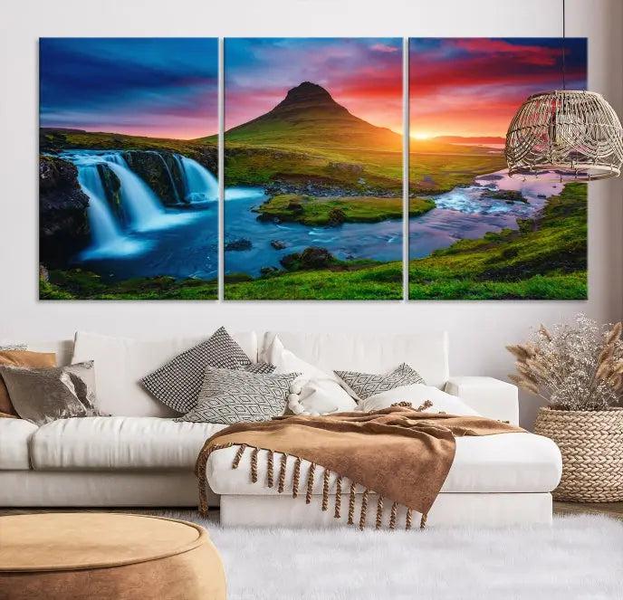 The living room displays a triptych wall art titled "Snaefellsjökull Nal Park and Kirkjufell Mountain," which captures a stunning sunset over a mountain and waterfall on museum-quality canvas. Each piece of the artwork is treated with UV-protective coating to ensure long-lasting vibrancy.