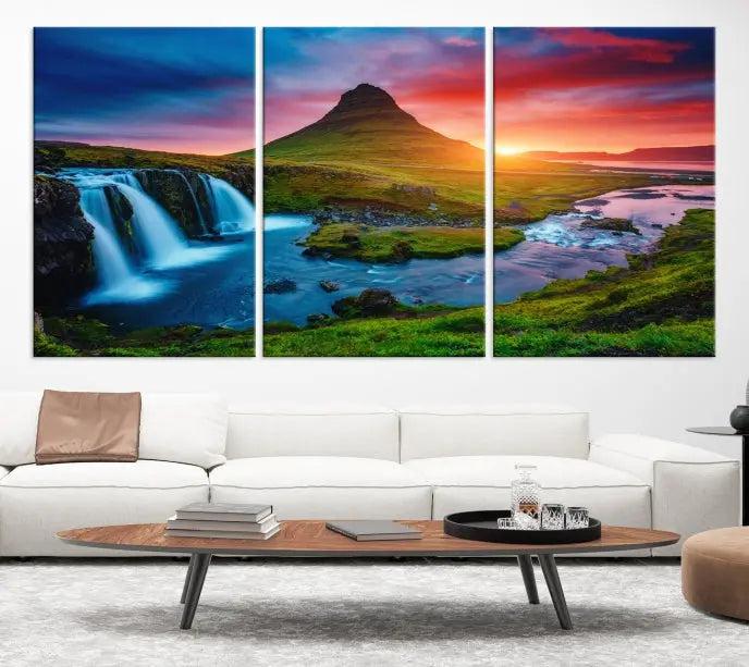 The living room displays a triptych wall art titled "Snaefellsjökull Nal Park and Kirkjufell Mountain," which captures a stunning sunset over a mountain and waterfall on museum-quality canvas. Each piece of the artwork is treated with UV-protective coating to ensure long-lasting vibrancy.