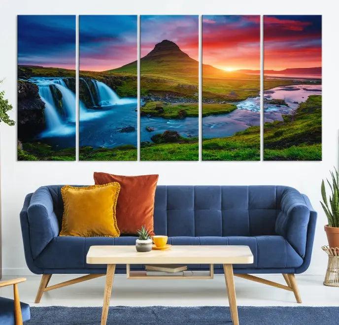 The living room displays a triptych wall art titled "Snaefellsjökull Nal Park and Kirkjufell Mountain," which captures a stunning sunset over a mountain and waterfall on museum-quality canvas. Each piece of the artwork is treated with UV-protective coating to ensure long-lasting vibrancy.