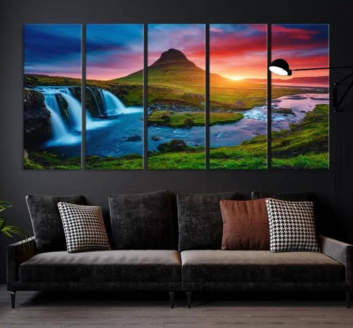 The living room displays a triptych wall art titled "Snaefellsjökull Nal Park and Kirkjufell Mountain," which captures a stunning sunset over a mountain and waterfall on museum-quality canvas. Each piece of the artwork is treated with UV-protective coating to ensure long-lasting vibrancy.