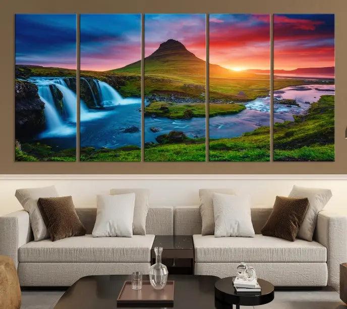 The living room displays a triptych wall art titled "Snaefellsjökull Nal Park and Kirkjufell Mountain," which captures a stunning sunset over a mountain and waterfall on museum-quality canvas. Each piece of the artwork is treated with UV-protective coating to ensure long-lasting vibrancy.