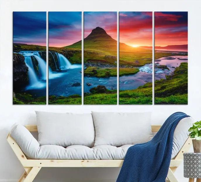 The living room displays a triptych wall art titled "Snaefellsjökull Nal Park and Kirkjufell Mountain," which captures a stunning sunset over a mountain and waterfall on museum-quality canvas. Each piece of the artwork is treated with UV-protective coating to ensure long-lasting vibrancy.