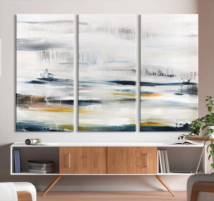 Above the wooden console, a three-panel "Soft Color of Abstract Canvas Print" adorns the dark wall with its museum-quality canvases enhanced by a UV-protective coating.