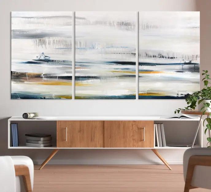 Above the wooden console, a three-panel "Soft Color of Abstract Canvas Print" adorns the dark wall with its museum-quality canvases enhanced by a UV-protective coating.