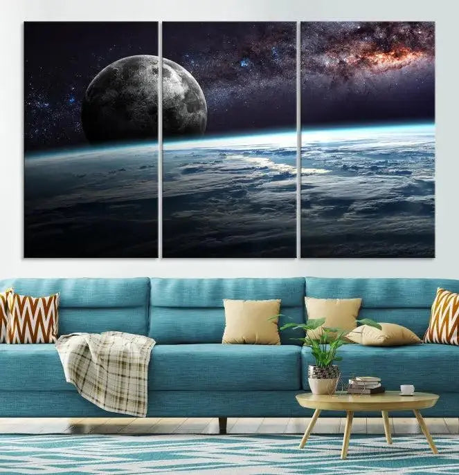 The Space and Planet Canvas Print, a triptych showcasing Earth and the Moon from space on museum-quality canvas with UV-protective coating, hangs prominently in the room.